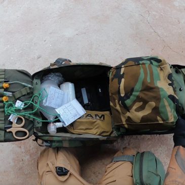 Tactical combat casualty care training with medical equipment and trauma kit